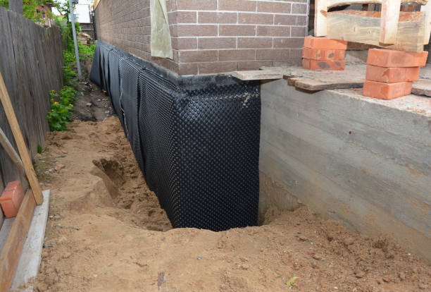 Happy homeowners after waterproofing job in Richland